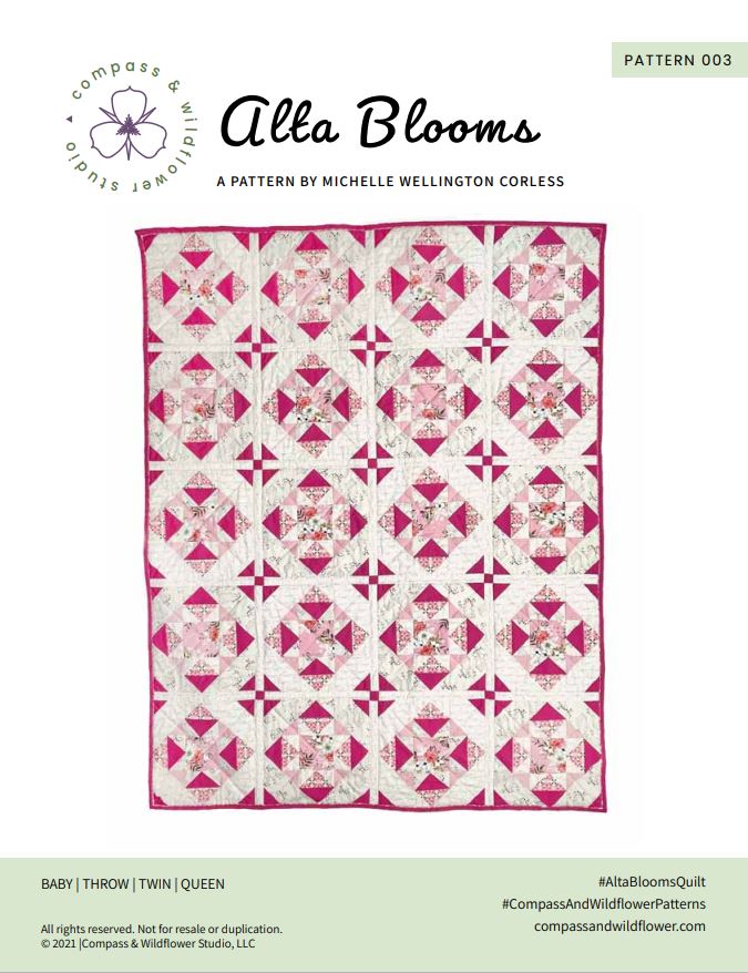Alta Blooms quilt pattern cover. A geometric quilt with a small star motif and triangular accents. Bright and medium pinks on a light cream background. Pattern name and company logo.