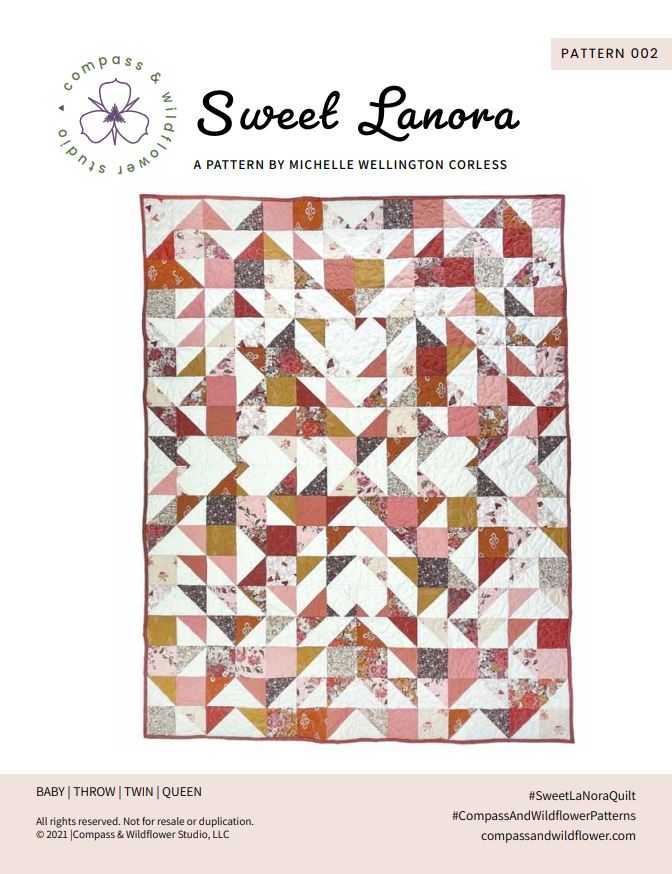 Sweet LaNora quilt pattern cover. A geometric quilt with triangle and heart motifs made of fabric with red and peach tones.  Pattern name and company logo.